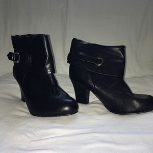 Black ankle-cut, high-heeled booties